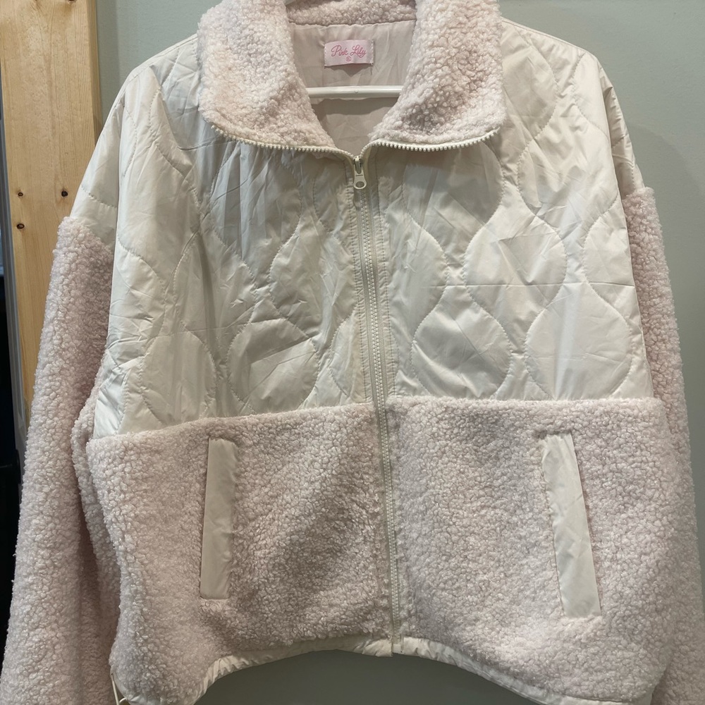 white sherpa-type jacket